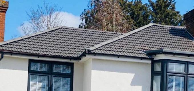 Grey slate roof with clean soffit and fascia line